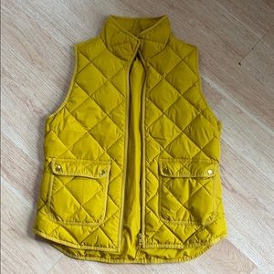 Yellow puff vest